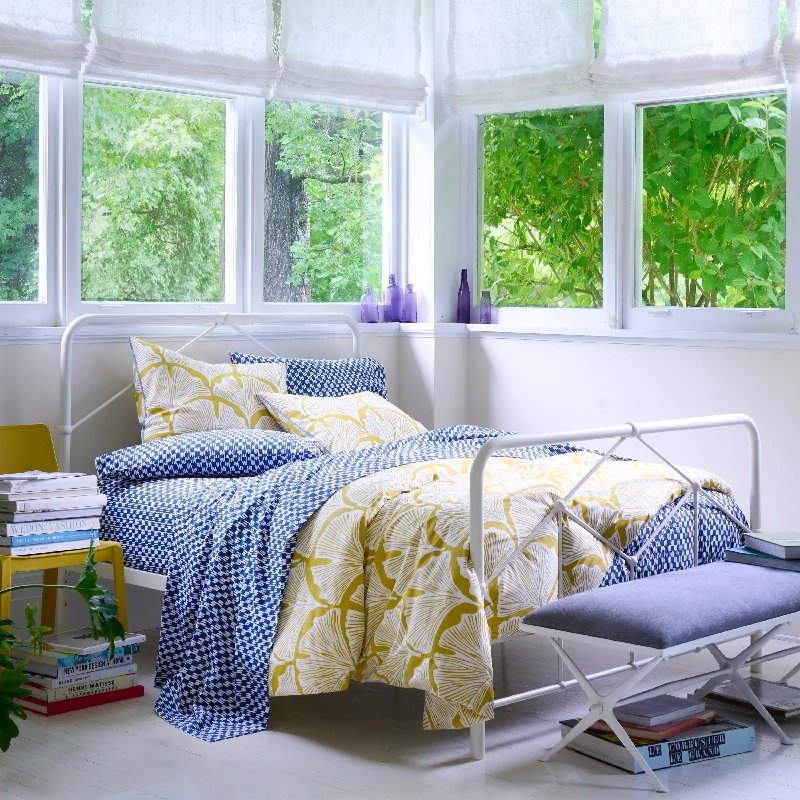 Goose down comforters known for their superior quality and insulationNovogratz by Utica Feather Palm Golden Mustard Comforter Set Goose down comforters known for their superior quality and insulationNovogratz by Utica Feather Palm Golden Mustard Comforter Set