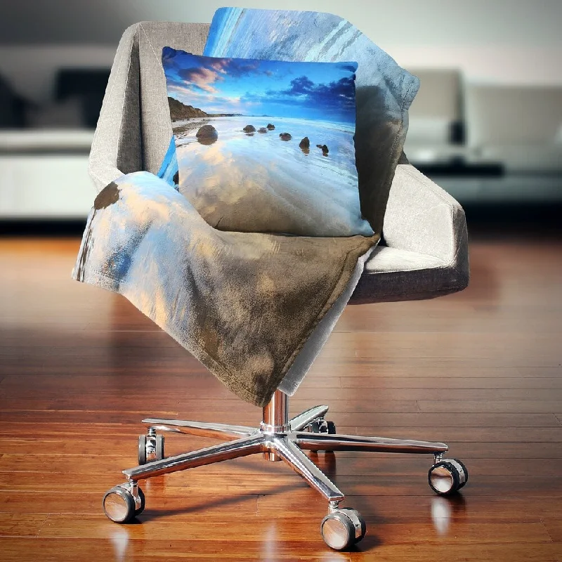 Recycled polyester blankets for an eco - conscious optionDesignart 'Cloudy Sky Over Moeraki Boulders' Seashore Photo Throw Blanket Recycled polyester blankets for an eco - conscious optionDesignart 'Cloudy Sky Over Moeraki Boulders' Seashore Photo Throw Blanket
