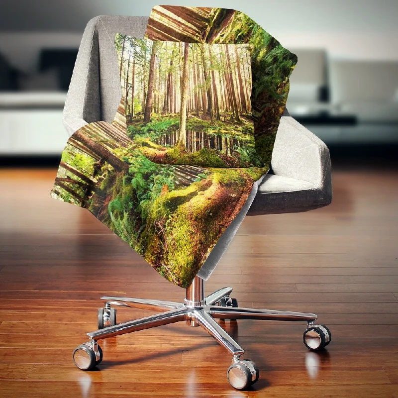 Recycled polyester blankets for an eco - conscious optionDesignart 'Dense Trees in Green Rain Forest' Landscape Fleece Throw Blanket Recycled polyester blankets for an eco - conscious optionDesignart 'Dense Trees in Green Rain Forest' Landscape Fleece Throw Blanket