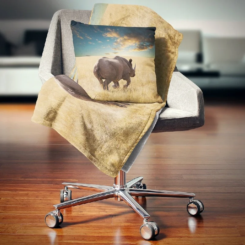 Fleece blankets for a cozy and plush textureDesignart 'Giant Rhino under Cloudy Sky' African Throw Blanket Fleece blankets for a cozy and plush textureDesignart 'Giant Rhino under Cloudy Sky' African Throw Blanket